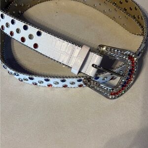 White Studded Belt Red and Blue Accents belt is 52 inches & buckle is 3  Long